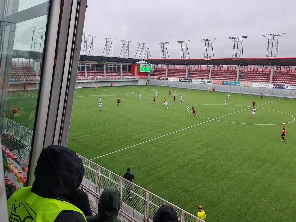 View on football pitch of Voždovac Stadium from the west stand